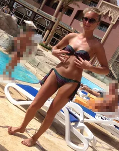 Sexy blonde babe in a bikini at the pool