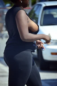 Chubby black lady with big tits and no bra lets it slip