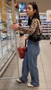 Nice booty in blue jeans at the supermarket