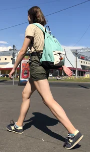 Cute Dorky Girl in Shorts with Thin Muscular Legs Street Candid Photos