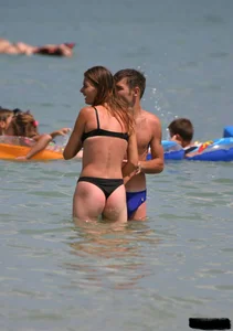Beach voyeur girls in bikinis, thongs and topless