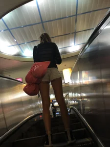 Hot Milf in Mini Shorts on the Subway Escalator and in the Train Candid Gallery