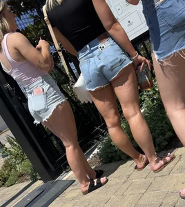 Blonde in cut offs with friends