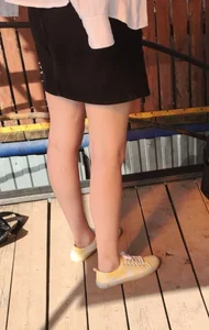 Slim Legs of a Candid Girl in a Skirt Creepshot