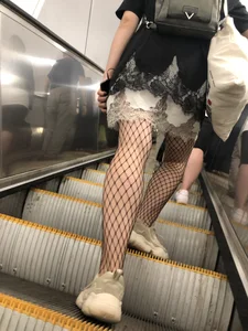 Cute Girl in Lacey Semi-Transparent Dress and Fishnet Pantyhose Subway Escalator Candid Photos Gallery