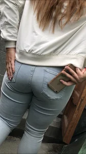 Fat ass in light jeans