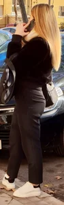 Tiny blonde in black pants