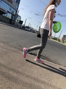 Nice candid girl wearing tight grey sweatpants, a mask and a hat