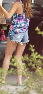 Hot teen neighbor getting ready for the beach in short shorts showing some cheek