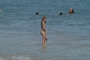 Girls on a nude beach in Sitges, Spain