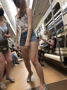 Cute And Slightly Awkward Tall Teen Girl in a Top and Denim Shorts Subway Train Candid Photos