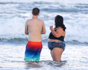 Extra thick girl at the beach in a bikini