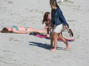 Skinny and sexy teen on the beach