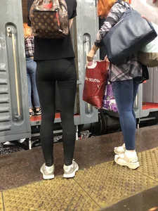 Teen Girl in Tights And Sneakers Standing on the Train Platform VPL Photos