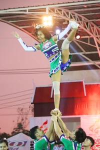 Bunch of athletic Thai cheerleaders at a competition