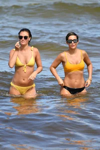 Frankie Bridge nip slips in a bikini on the beach