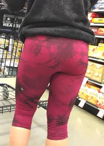 Milf grocery shopping in red leggings with a great ass