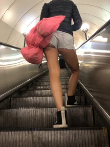 Hot Milf in Mini Shorts on the Subway Escalator and in the Train Candid Gallery