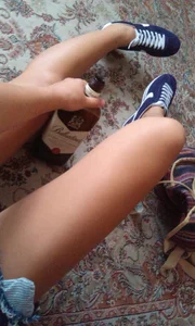 Girl Sitting on the Floor Skinny Legs Selfie
