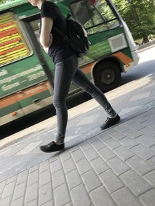 Skinny candid teen wearing tight black jeans walking down the street creepshots