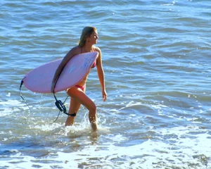 Candid surfer babes on the beach and in bikinis