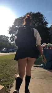 Girl Walking up the Stairs in a Skirt Candid