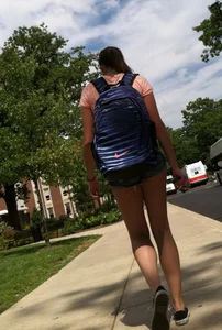 Hot college girl in little jean shorts showing some cheeks and legs