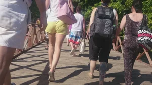 Milf in yellow shorts with vpl and a wedgie