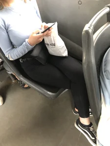 Skinny Girl in Tight Black Jeans on the Bus Stop Candid Photos