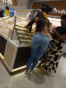 Brazilian Butt highest level. Tanlines peeking out of the Jeans