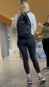 Tall Blonde College Girl In Black Leggings