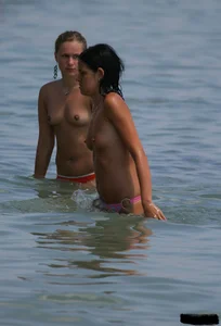Beach voyeur girls in bikinis, thongs and topless