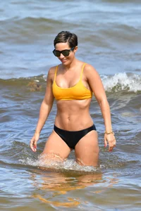 Frankie Bridge nip slips in a bikini on the beach