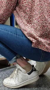 Brunette girl with nice ass sexy PAWG in tight jeans in a store