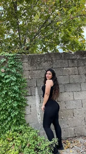 Hot Girl in a Top And Leggings Street Photos