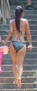 Sexy brunette milf in a bikini with a great body, nice ass and some camel toe