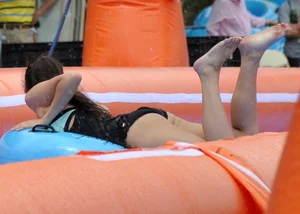 Beautiful brunette tube girl in black bikini