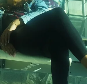Nice Candid Girl in Tight Pants Sitting With Crossed Legs at the Airport Creepshot