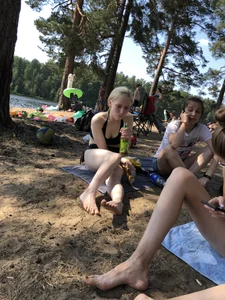 Group of Girls in Swimsuits at a Lake Beach