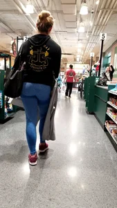 Milf with a nice ass in tight blue leggings at Dick's