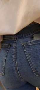 Girl is showing her blue jeans