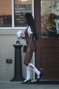 Sexy ebony Tilted Kilt employee in her uniform