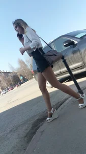 Girl in High Heeled Sandals and Shorts in Pantyhose with Long Hot Legs City Candid