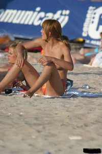 Beach voyeur girls in bikinis, thongs and topless