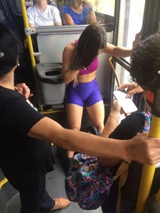 Girl with Muscular Legs in Spandex Shorts and Top Bus Creepshot