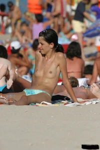 Beach voyeur girls in bikinis, thongs and topless