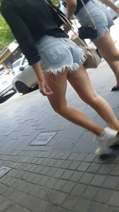 Hot Butt in Fringed Denim Shorts And Nice Legs Street Creepshots