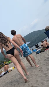 beautiful tight brunette hair girl in black bikini. OC