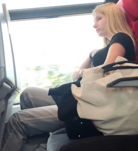 Hot busty blonde on train