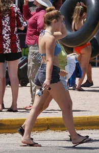 Girls in bikinis getting ready for tubing